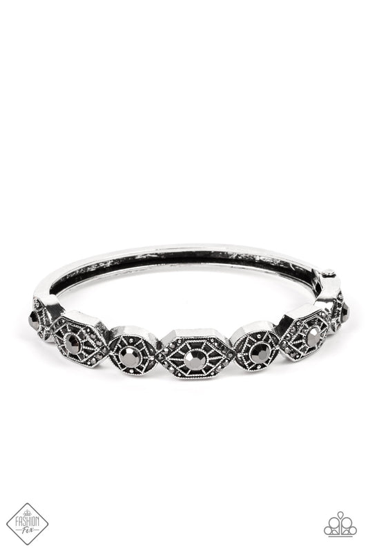 Eye-Opening Opulence - Silver Bracelet - Paparazzi Accessories