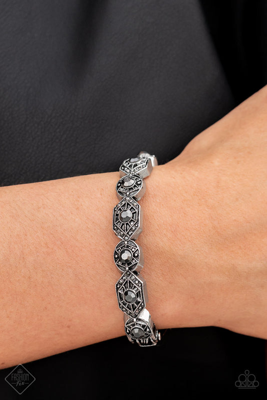 Eye-Opening Opulence - Silver Bracelet - Paparazzi Accessories